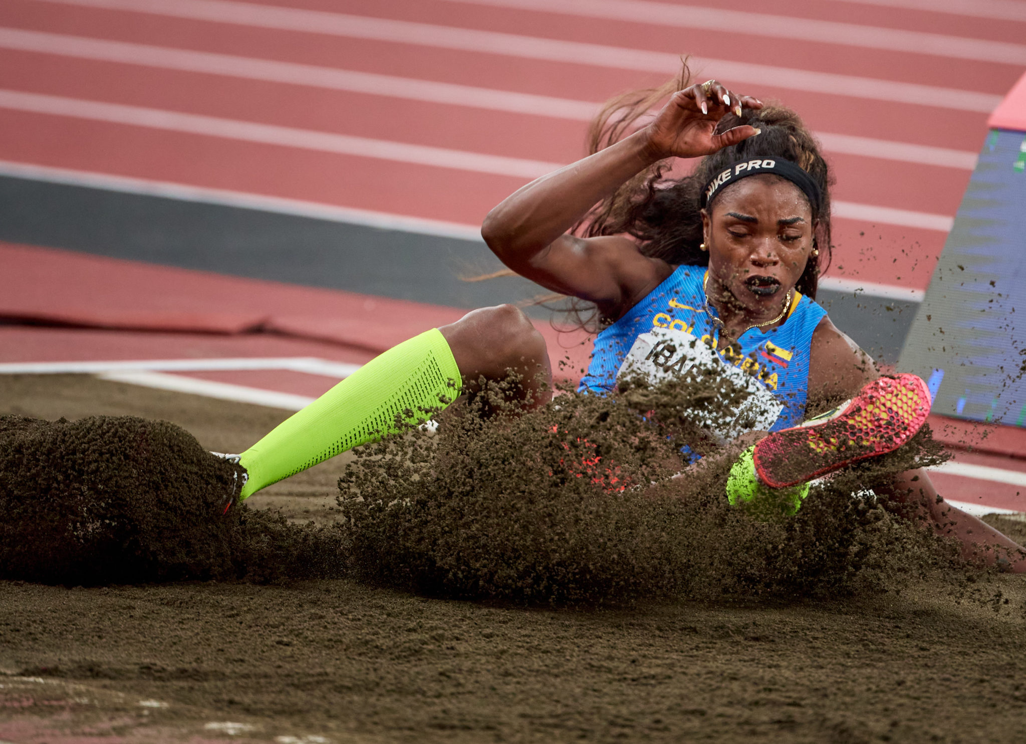 Photograph of Columbia's Caterine Ibarguen in the women's triple jump final during the Tokyo 2020 Olympics at the Olympic Stadium in Tokyo, Japan.