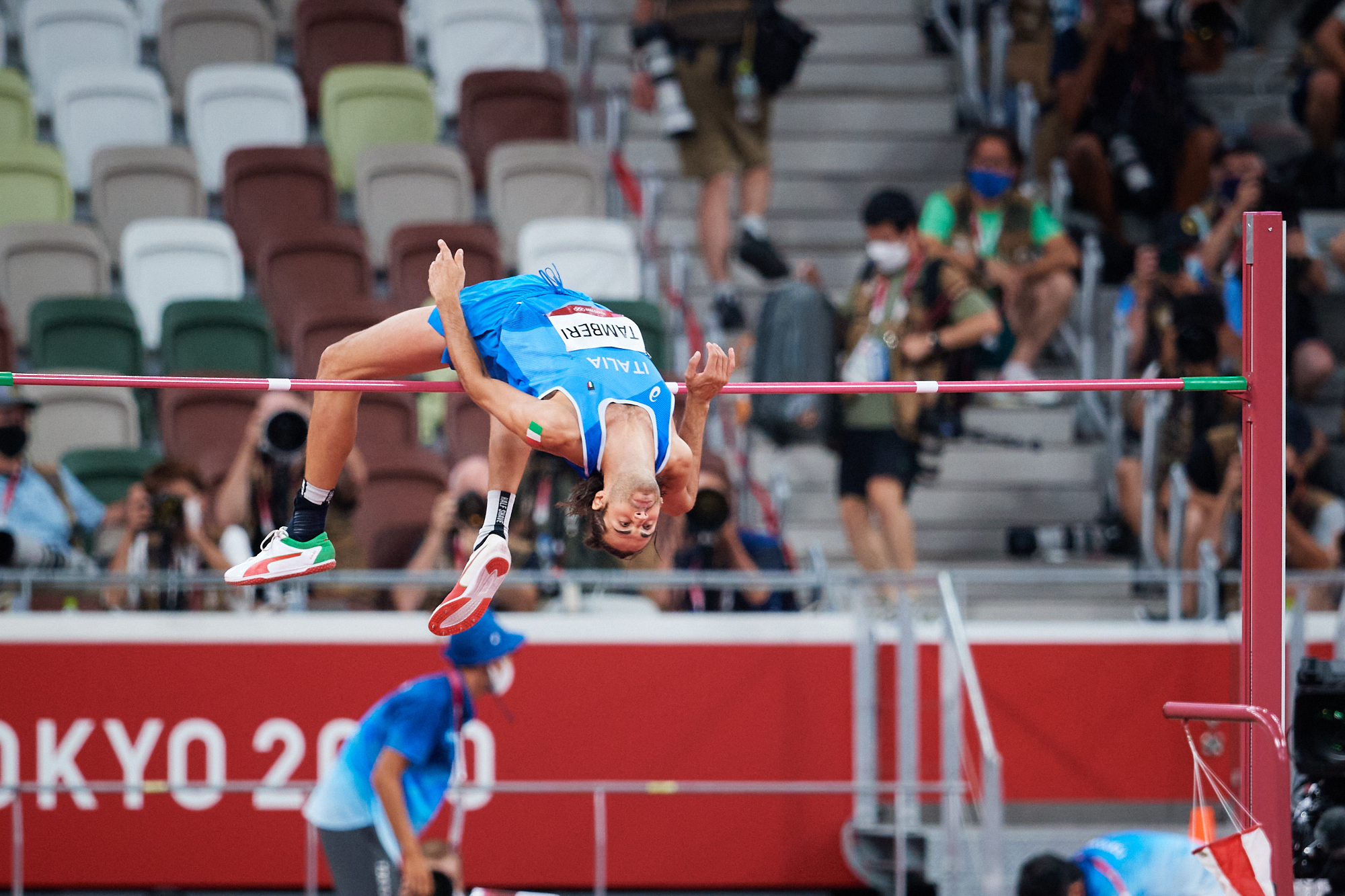 Photo of Gianmarco Tamberi during high jump qualifications at the 2020 Tokyo Olympics in the Olympic Stadium in Tokyo, Japan.