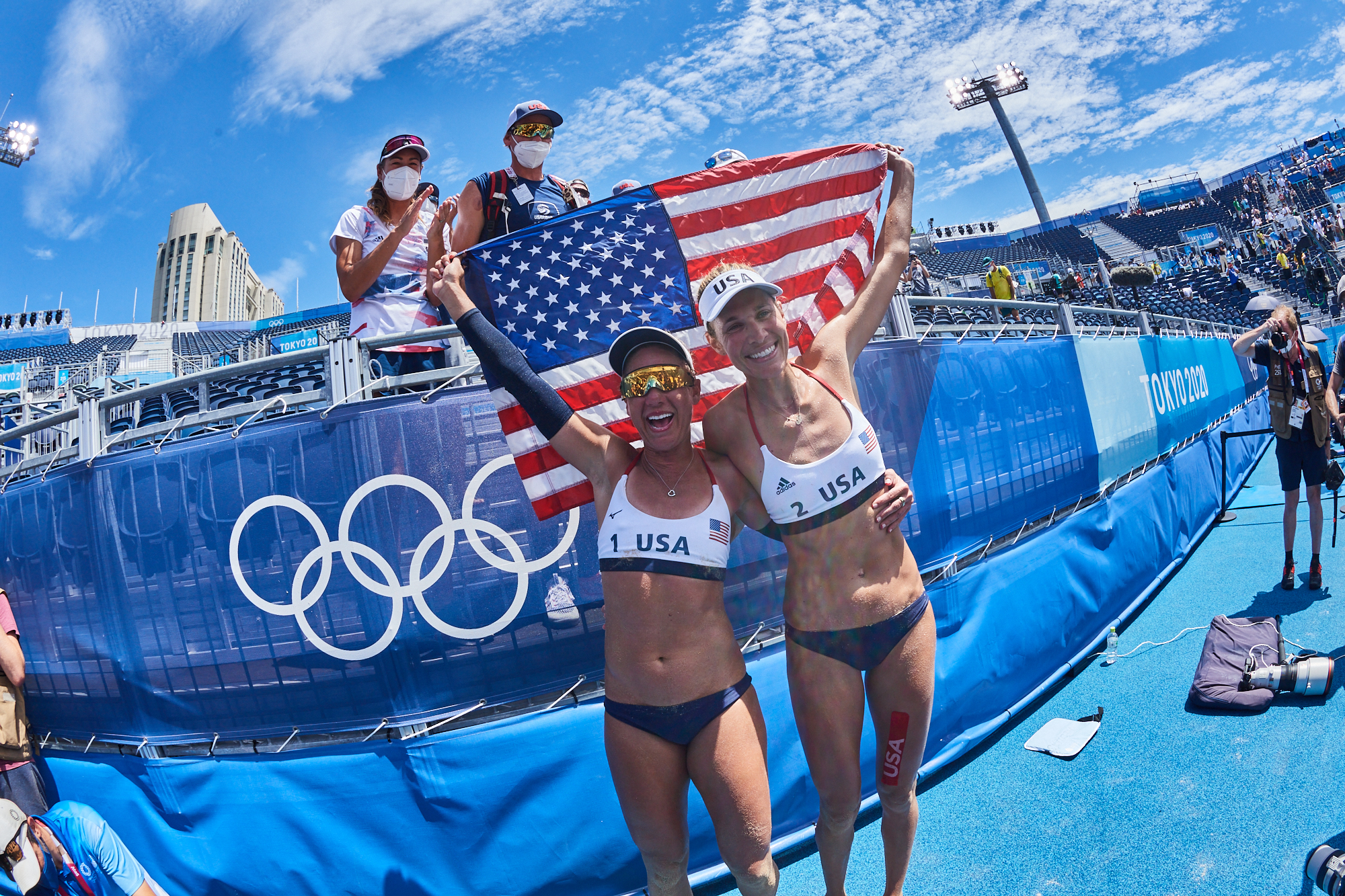 Photo of April Ross and Alix Klineman from Team USA after winning the gold medal match in women's beach volleyball Tokyo 2020. ZUMA PRESS
