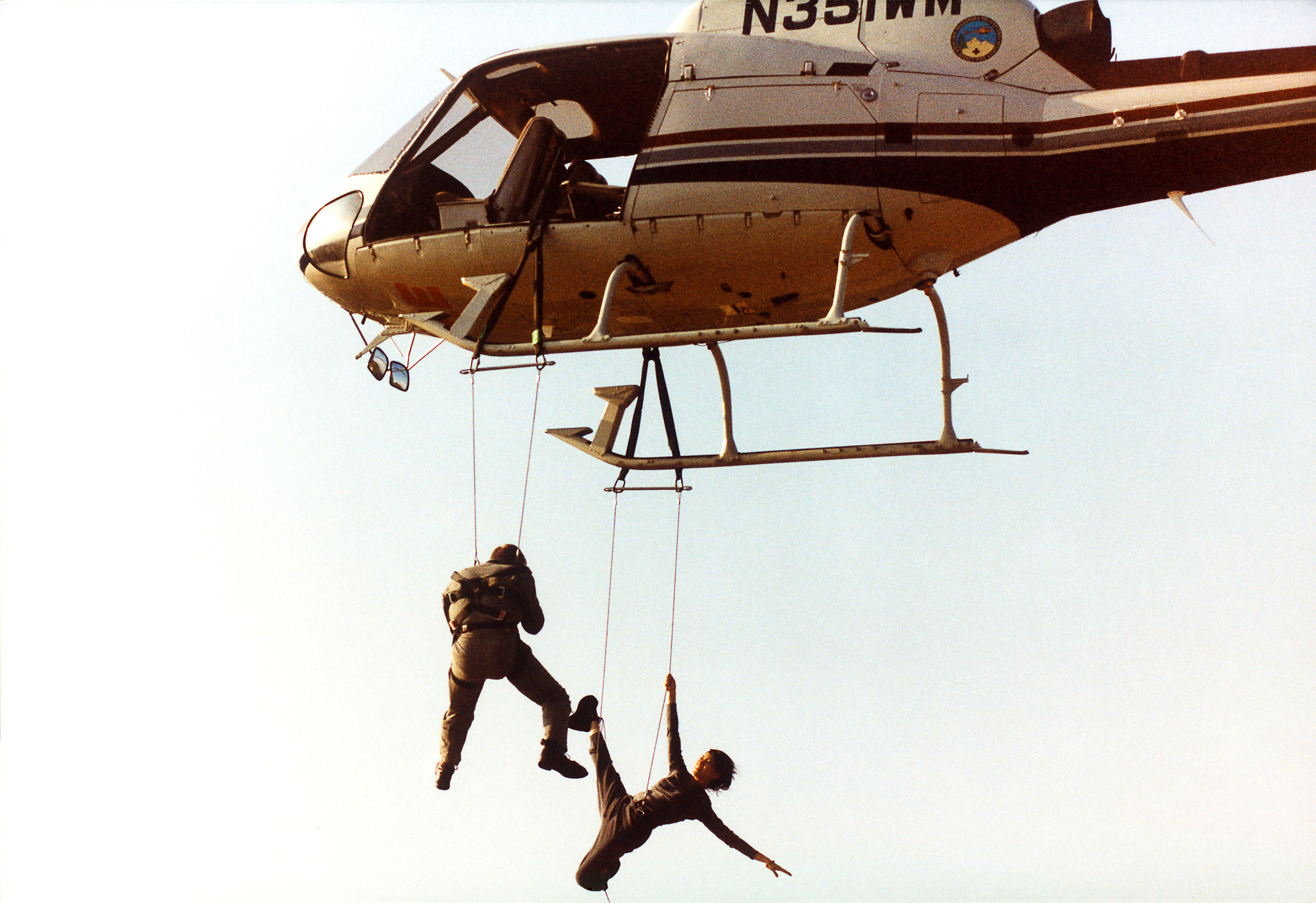 Michelle Yeoh dangling from a helicopter during photo shoot with world-famous photographer Joe McNally for National Geographic magazine.